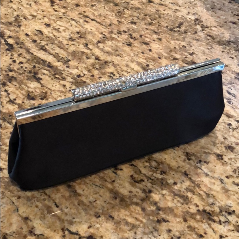 Small black clutch.